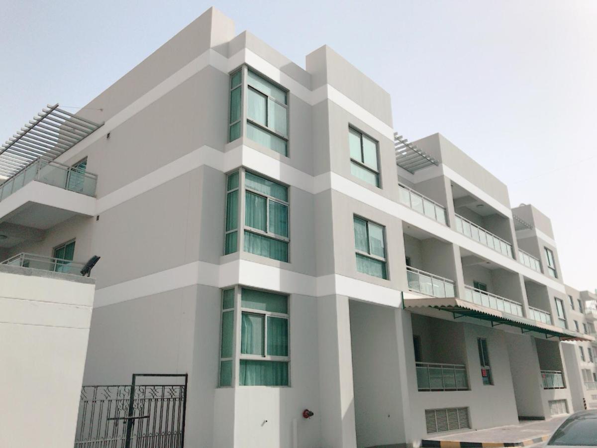 Stout Apartments Manama Rum bild